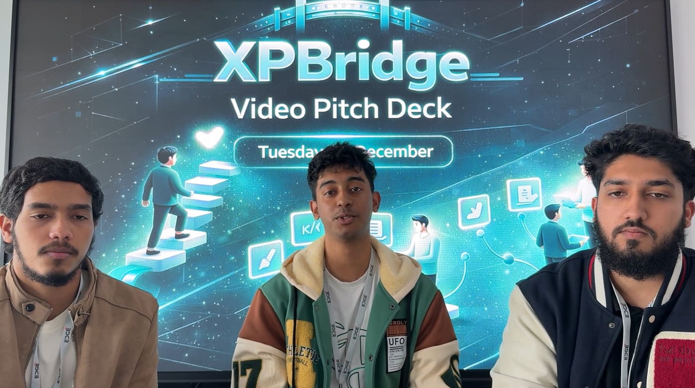 Three people recording a video pitch in front of a screen reading 'XPBridge - Video Pitch Deck'.